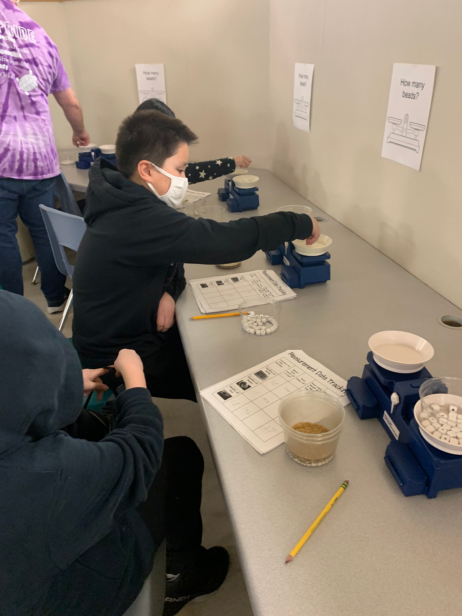 picture of student weighing material